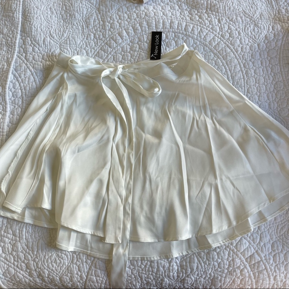 new with tags — tie waist mini skirt